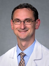 Head shot of Mark Simone