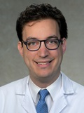 Head shot of Adam Waxman